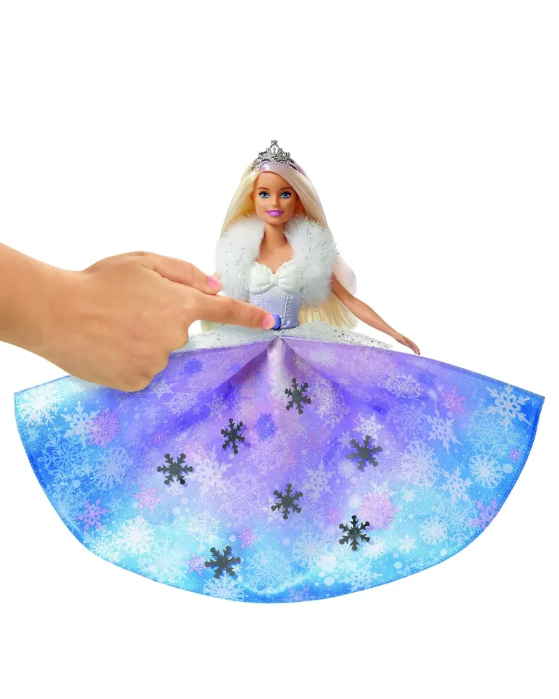 BARBIE PRINCESSE FLOCONS  Appuie sur le bouton pour que le jupon se...