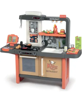 CUISINE KID RESTAURANT 63 ACC. Un côté cuisine avec 4 plaques de cu...